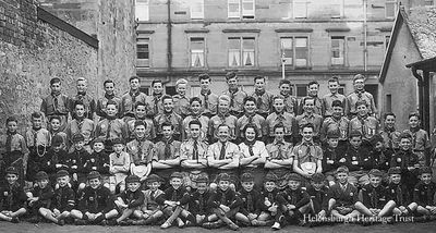 1st Craigendoran Scouts
A group of 1st Craigendoran Scouts and Cubs with their leaders at the John Street Scout Hall in the 1950s. More details would be welcomed. Image supplied by Alistair Quinlan.

