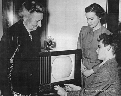 Presentation to family
John Logie Baird's sister Annie and his children Diana and Malcolm are presented with a television set from the Scophany Television Company in April 1952.
