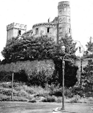 Castle demolition
The main tower of Ardencaple Castle is seen just before its demolition in July 1959. The square tower on the left was retained and is still standing.
