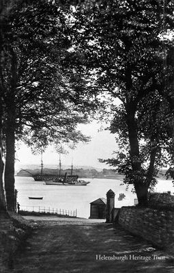Ardenconnel Road, Rhu
A view down Ardenconnel Road showing a yacht and the Training Ship Empress moored in the Gareloch off Rhu. Image circa 1913.
