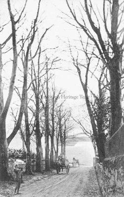 Ardenconnel Road, Rhu.
Pedestrians and horse-drawn carts make their way up Ardenconnel Road in Rhu, with the Training Ship Empress in the Gareloch beyond. Image circa 1911.
