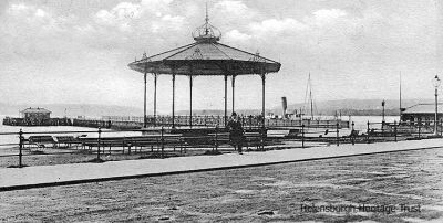 Bandstand and pier
Looking across from the Sinclair Street junction towards the bandstand, with the pier and a steamer beyond. Image circa 1910.
