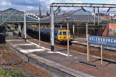 Helensburgh Central
A 1975 view of Helensburgh Central Station with a Blue Train at the platform. Image copyright David Christie, supplied by Nottingham Heritage Vehicles.

