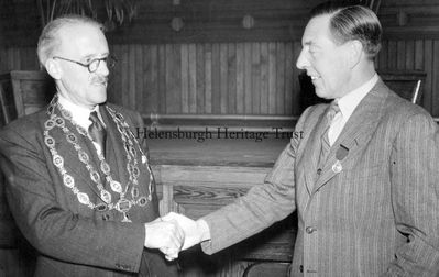 Painters president
Helensburgh man Gregory Alexander Burgess (left) is congratulated on his election as president of the Federation of Master Painters and Decorators in Scotland at the 1952 annual conference held at Shandon Hydro Hotel by his predecessor, Robert Carfrae. Four years later Mr Burgess was elected president of the Incorporated Institute of British Decorators. Image supplied by Jenny Sanders.
