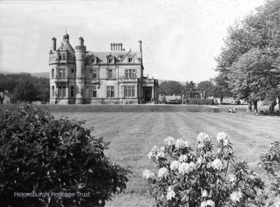 Cairndhu House
Cairndhu on Helensburgh seafront when it was a family home. Later it became the Cairndhu Hotel, then a nursing home for the elderly, and it is now disused. Originally Cairndhu House, it was built in 1871 to a William Leiper design in the style of a grand chateau for John Ure, Provost of Glasgow, whose son became Lord Strathclyde and lived in the mansion. Image, date unknown, supplied by Mrs Sheila Allan.
