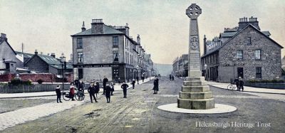 Colquhoun Square
The pink granite Centenary Cross, donated in 1902 by Sir James Colquhoun of Luss to mark the centenary of the granting of the Burgh Charter, in its original position in the centre of Colquhoun Square. It was moved to the north west quadrant as it had become a traffic hazard. Image date unknown.
