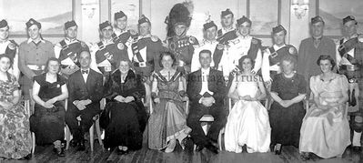 Country dancers
Members of the executive of the Helensburgh Country Dance Society at their annual Ball in the Queen's Hotel on December 4 1953. in the front row centre and third from right are branch founders Cathie Ramsay and Norah Dunn, and between them is branch president William Hunter, manager of James Simpson Ltd. in West Princes Street. In the background are members of an Australian pipe band which was visiting the district.
