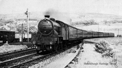 Craigendoran train
The 4.17 p.m. Glasgow Queen Street to Helensburgh train, drawn by Class V3 2-6-2 tank engine no.67626, is seen approaching Craigendoran Station on July 2 1955. Image by Ian S.Pearsall.
