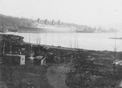 Breaking of the Aquitania
Cunard liner Aquitania being broken up at Faslane Shipbreaking Yard in 1950. The Aquitania had been built at John Brown's shipyard in Clydebank in 1914, and was the last of the four-funnelled vessels in service in the world. This photo was taken by Howard Macdonald.
Keywords: Aquitania, Faslane, Funnels, Breaking