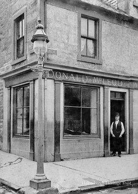 Donald MacLeod
Tailor Donald MacLeod is seen at the door of his shop at the junction of East Clyde Street and Maitland Street in Helensburgh. Donald also wrote 'A Nonogenarian's Guide to Garelochside and Helensburgh', based on what he had been told by his uncle Gabriel MacLeod, who was the nonogenarian. Image, circa 1900, supplied by a descendant, Molly Bradshaw of Kilcreggan.
