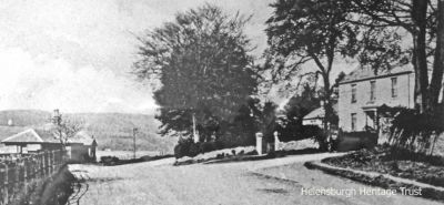 Pier Road, Rhu
An old image of the junction of the seafront road and Pier Road, Rhu, with the pier house opposite. The mansion was Dunmore House, which was eventually demolished and replaced by two matching modern houses. Image by courtesy of Jim Shields.
