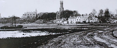 Rhu village
An early image of the village of Rhu, at that time Row. It shows the school where the village green now is, and the villa Ardenvohr, built in 1857 to the design of local architect Thomas Gildard and at various times the home of the Muir and Hoggans families. It became the Royal Northern Yacht Club clubhouse in 1937, and in 1978 the club's name changed to the Royal Northern and Clyde Yacht Club. Image date unknown.

