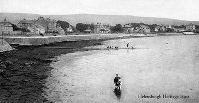 East Bay
Children paddle in the Clyde in this old photograph of Helensburgh's East Bay, with the Queen's Hotel in the distance. Image date unknown.
