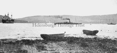 Gareloch Steamer
A steamer enters the Gareloch after passing the Training Ship Empress moored off Kidston Park. Circa 1920.
