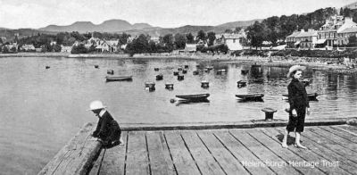 Garelochhead from pier
Two boys play on the pier in this old view of Garelochhead published by M.C.Robertson of West End Library, Helensburgh. The pier, built in 1879, was demolished in 1992.

