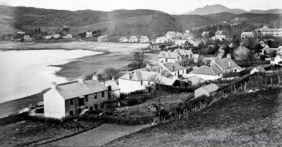 Historic photo
An albumen photo of Garelochhead village, c.1890, taken by George Washington Wilson (February 7 1823-March 9 1893), a pioneering Scottish photographer. In 1849, he began a career as a portrait miniaturist, switching to portrait photography in 1852. He received a contract to photograph the Royal Family, working for Queen Victoria and Prince Albert. Later he switched to landscape photography. An albumen print was made by coating thin paper with a layer of egg-white containing salt and sensitised with a silver nitrate solution, then printed using daylight under a negative. The resulting paper had a smooth surface with a fine sheen.
