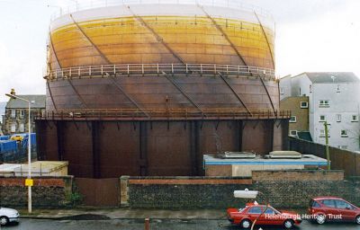 Burgh gasometer
The gasometer, built in 1928, stood between East Clyde Street and East Princes Street opposite Helensburgh Central Station. It was decommissioned in 2012 and demolished in the summer of 2014, to be replaced by a car park. Photo by Kenneth Crawford.
