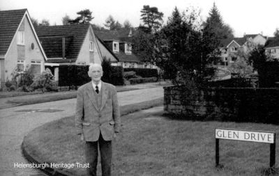 His street
Helensburgh's last Provost, the late Norman M.Glen, in front of the street named after him. Photo by the late Kenneth Crawford.
