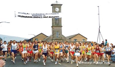 Half-Marathon
Starters in the Helensburgh People's Half Marathon, sponsored by Douglas Buchanan, set off along West Clyde Street. But which year was it? Image supplied by Gordon Fraser.
