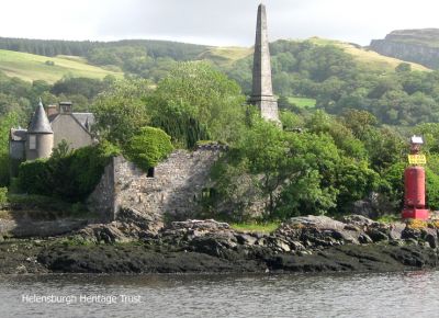The Bowling Obelisk
This memorial to Henry Bell, erected in 1839, stands in the grounds of the semi-derelict Dunglas Castle, which is within a secure area owned by Esso to which entry cannot be obtained. This image was taken by Heritage Trust chairman Stewart Noble while on board the paddle steamer Waverley in 2011.
