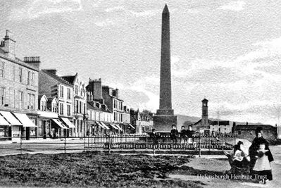 Henry Bell Monument
Looking east along Helensburgh's west promenade with the Henry Bell monument in the foreground. Image circa 1912.
