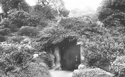 Hermit's Well
Legend has it that a hermit lived in and gave his name to Hermitage Park. This wishing well was known as the Hermit's Well, and it was said that he granted a wish to those who drank from the copper ladle inside. It exists to this day, but is in a very poor state. Image date unknown.
