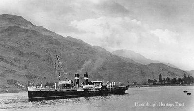 Jeanie Deans at Arrochar
The popular paddle steamer Jeanie Deans leaves Arrochar, circa 1931. She was built by Fairfield at Govan and launched in 1931, then extensively refitted after war service. She remained a passenger favourite on cruises from Craigendoran until the end of the 1964 season. The next year she went to the Thames and was renamed 'Queen of the South'. She was broken up in Antwerp, Belgium, in 1967.
