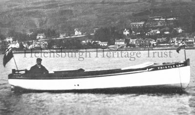 Motor Boat Thistle
The Thistle and helmsman are pictured in the Gareloch opposite Garelochhead, circa 1920.
