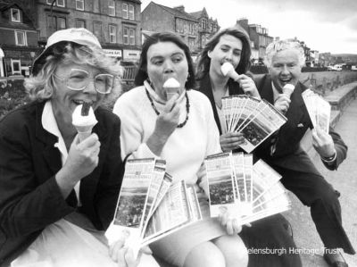 Local councillor Billy Petrie and three ladies enjoy their ice creams as they launch a new tourist leaflet 'In and around Helensburgh and Rosneath District'. Image daye unknown.
