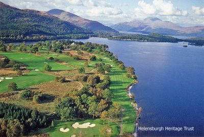 Loch Lomond Golf Club
A postcard picture of the par 5 sixth hole at the Loch Lomond Golf Club at Luss. The course occupies land previously held by Clan Colquhoun and includes the clan's seat of Rossdhu Mansion as its clubhouse. The par 71 7,100 yard course was designed by Tom Weiskopf, was opened in 1993, and has hosted the Scottish Open and the Solheim Cup. Image copyright Brian Morgan.
