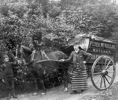 Meat delivery
Helensburgh butcher Peter McKellar, assisted by a young boy, delivers meat to one of the Helensburgh mansions with a rhododendron-ringed drive. Image date unknown.
