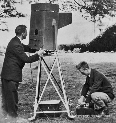 Noctovision
John Logie Baird (left) is seen operating his night vision device, the Noctovisor, on Boxhill in Surrey in 1929. It was slung on gimbals and rotated about a circular compass scale, and was said to be able to pick up a ship's lights in fog and give a compass bearing, or televise people who were in complete darkness.
