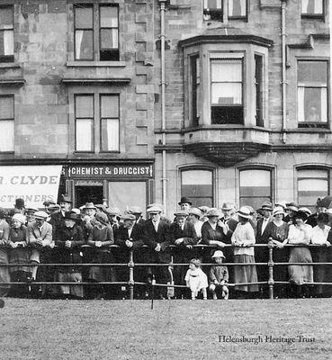 Watching putting
An eager crowd look on at what was presumably a putting competition on Helensburgh's west promenade putting green. Any more information would be welcomed. Image, circa 1930, supplied by Alistair Quinlan, who thinks it may have been taken by George Truman as his wife Agnes (known as Cissie), nee Orr, is third from the right. Agnes was Alistair's great aunt.
