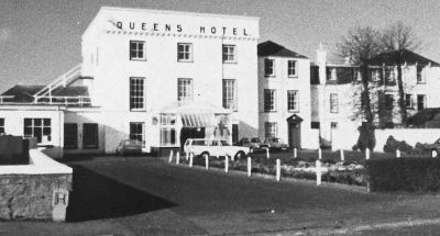 The Queen's Hotel
Originally the Baths Hotel and home of Helensburgh's first Provost, steamship pioneer Henry Bell, the Queen's Hotel was built by Bell in 1806. It was converted into flats in the mid-1980s. In front of the front door is the Volvo estate car used for many years by the last manager, Norman Drummond. Image date unknown.
