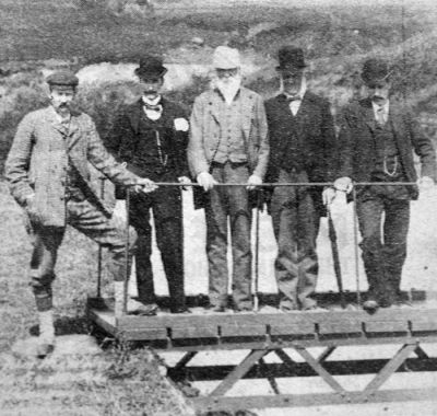 Waterworks trip
Local worthies, including F.C.Buchanan of Rowmore, Rhu (left), celebrate the opening of a new dam and waterworks in the hills above the village, c.1896.
