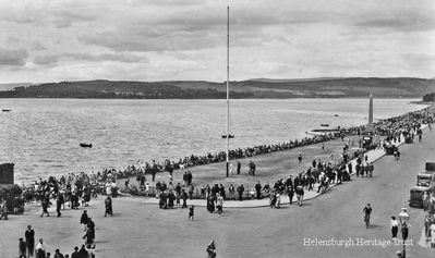 Seafront packed
A sunny day brings out the crowds to Helensburgh seafront, looking west from Colquhoun Street. Image circa 1935.
