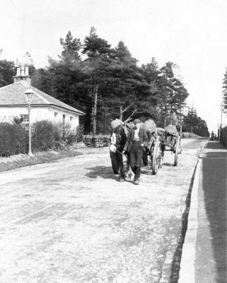 Old Milligs Toll House
The Toll Cottage at the top of Sinclair Street, Helensburgh, looks pristine in this 1911 picture as a farmer leads his horse and cart down the hill. In 2018-19 the little building was substantially expanded and modernised, and is now a private dwelling

