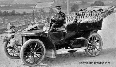 Uncle Hector's car
An image of an old car, possibly a Sunbeam or Argyll tourer, which has a note on the back: "Uncle Hector driving a car at Helensburgh." The single G registration plate is Glasgow from 1903-21. More information would be welcomed. Image supplied by Donald John Chisholm.
