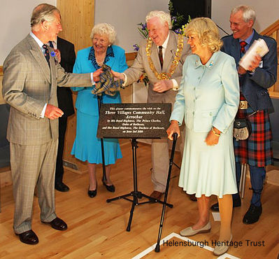 Prince Charles at Arrochar
HRH Prince Charles and HRH the Duchess of Cornwall visited the recently built Three Villages Community Hall at Arrochar on Thursday June 3 2010. The royal couple are seen with Argyll and Bute Provost Billy Petrie and his wife Jean from Helensburgh following the unveiling of a plaque. Photo by Howard Page of Arrochar, Ardlui and Tarbet Heritage Group.
