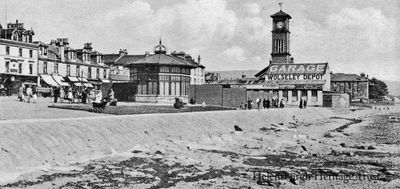 Bandstand and Garage
A view of the Helensburgh seafront bandstand with the Granary building in the distance during the period that it was a Garage and Wolseley Depot, circa 1920.
