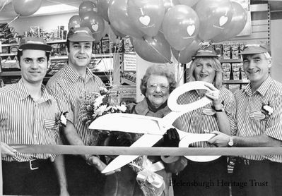 Wonder of Woolies-2
Local historian Pat Drayton is seen with members of staff inside the Woolworths store in West Clyde Street, Helensburgh, in October 1997. She won a competition to perform the official opening of a new look store after extensive refurbishment and was treated to a champagne breakfast before the opening. The store was open for many years until it closed in January 2009 when the chain went into administration.
