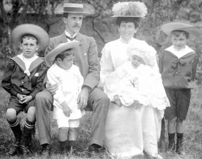 The Thorburn Family
Robert Thorburn, a Helensburgh grocery store manager and keen amateur photographer, with his wife, Christina Graham from Rhu, and family. Taken around 1909.
